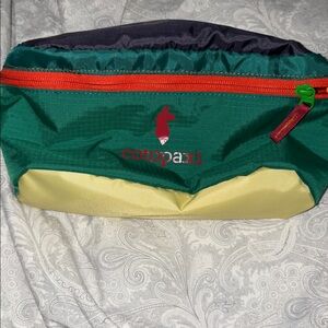 Cotopaxi Colorful Hip Pack with Red Zipper